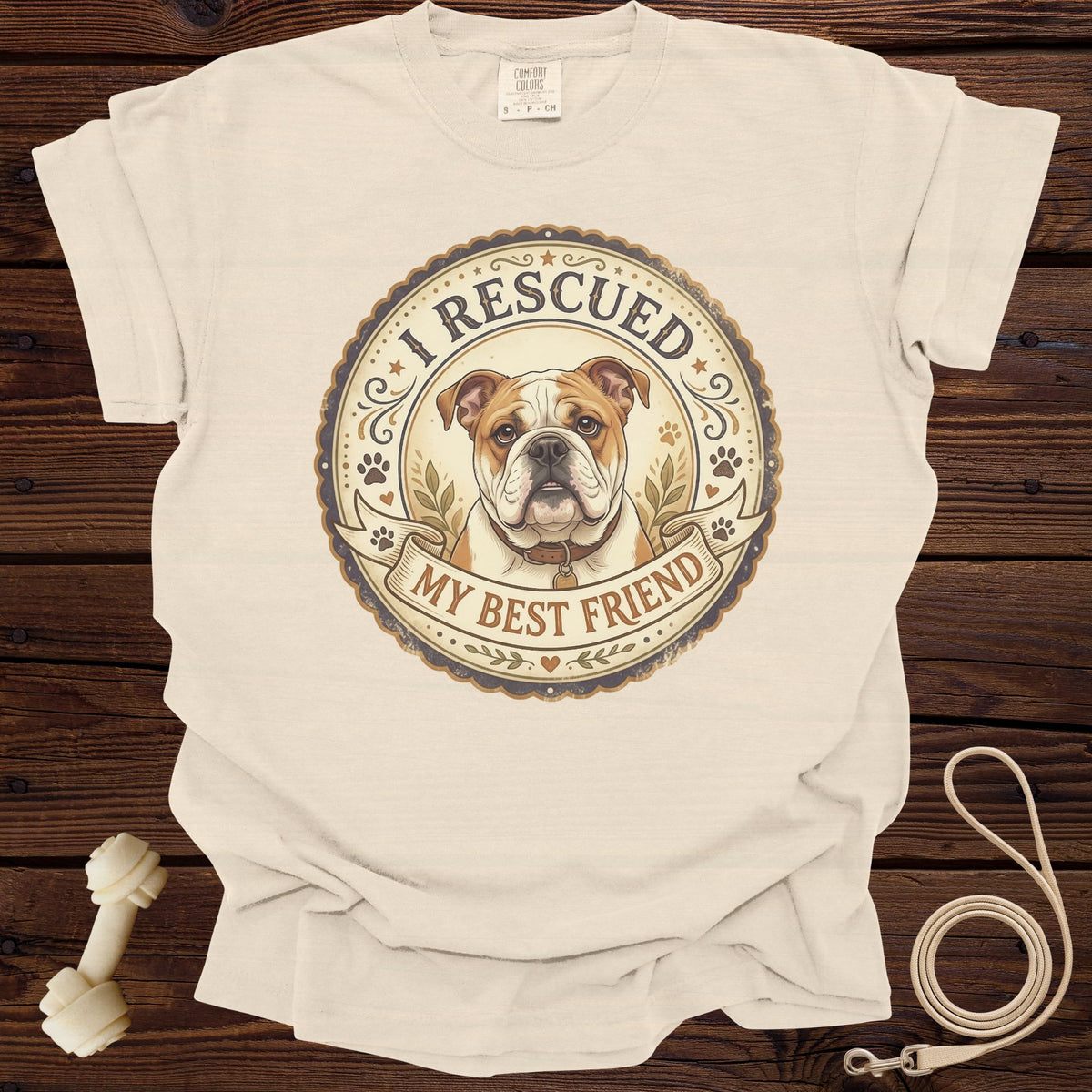 Cream t-shirt with circular graphic of English bulldog and text "I RESCUED MY BEST FRIEND".