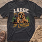 Golden retriever wearing sunglasses and a collar with "The Boss" tag, text says "LARGE AND IN CHARGE".