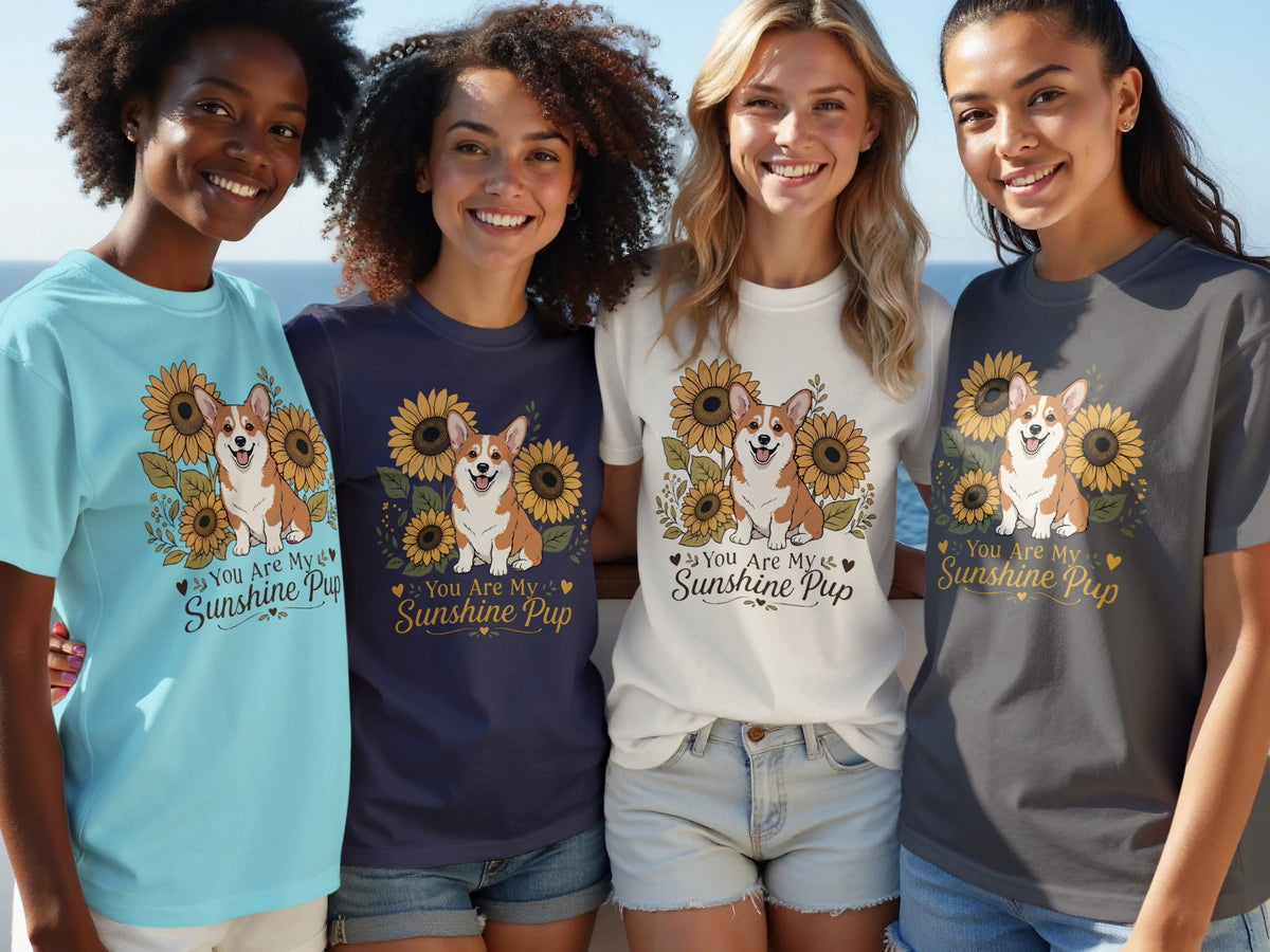 Four women wearing t-shirts with a corgi and sunflowers design that reads "You Are My Sunshine Pup".