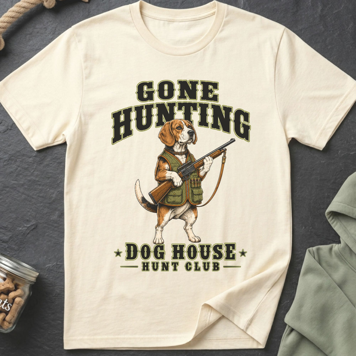 Beagle in hunting vest holding a rifle with "Gone Hunting Dog House Hunt Club" text.