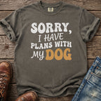 T-shirt with "Sorry, I have plans with my dog" text and dog paw graphics.