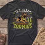 German Shepherd dog with stick and bandana on t-shirt, with "Trailhead Zoomies" text.