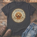 Dark grey t-shirt with gold seal graphic of a dog and text "I RESCUED MY BEST FRIEND".