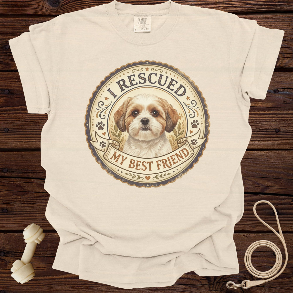 Cream t-shirt with "I Rescued My Best Friend" text and dog graphic.