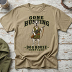 Dalmatian dog in hunting vest holding rifle with text "GONE HUNTING DOG HOUSE HUNT CLUB".
