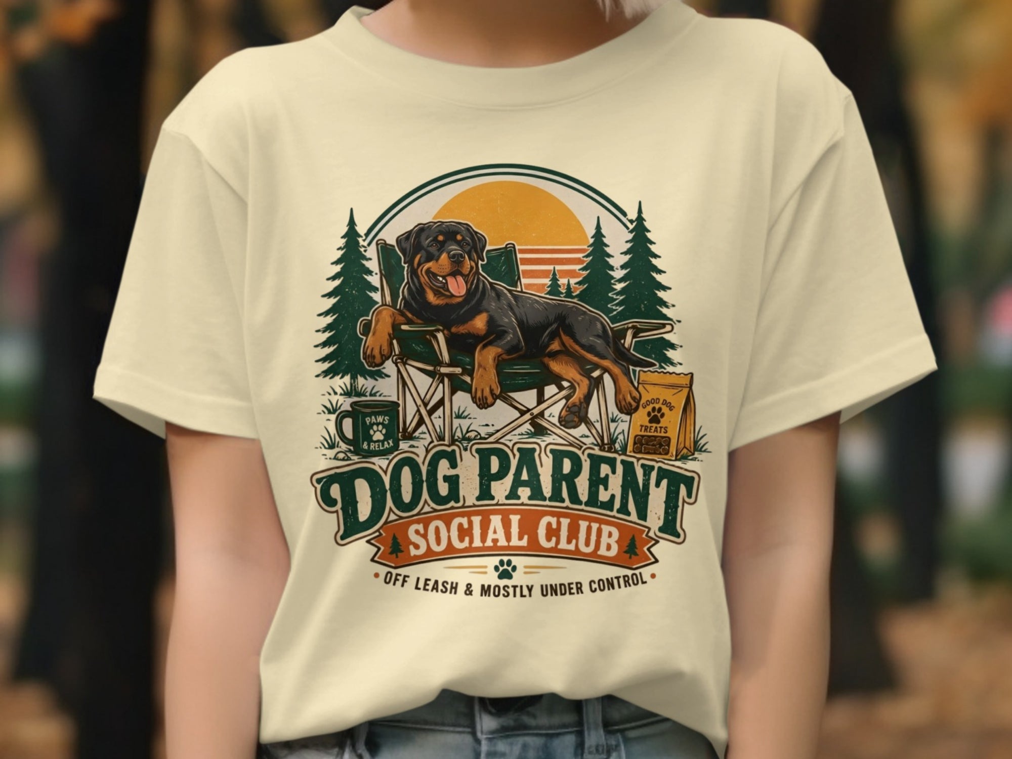 Rottweiler relaxing in a camp chair with "Dog Parent Social Club" text.