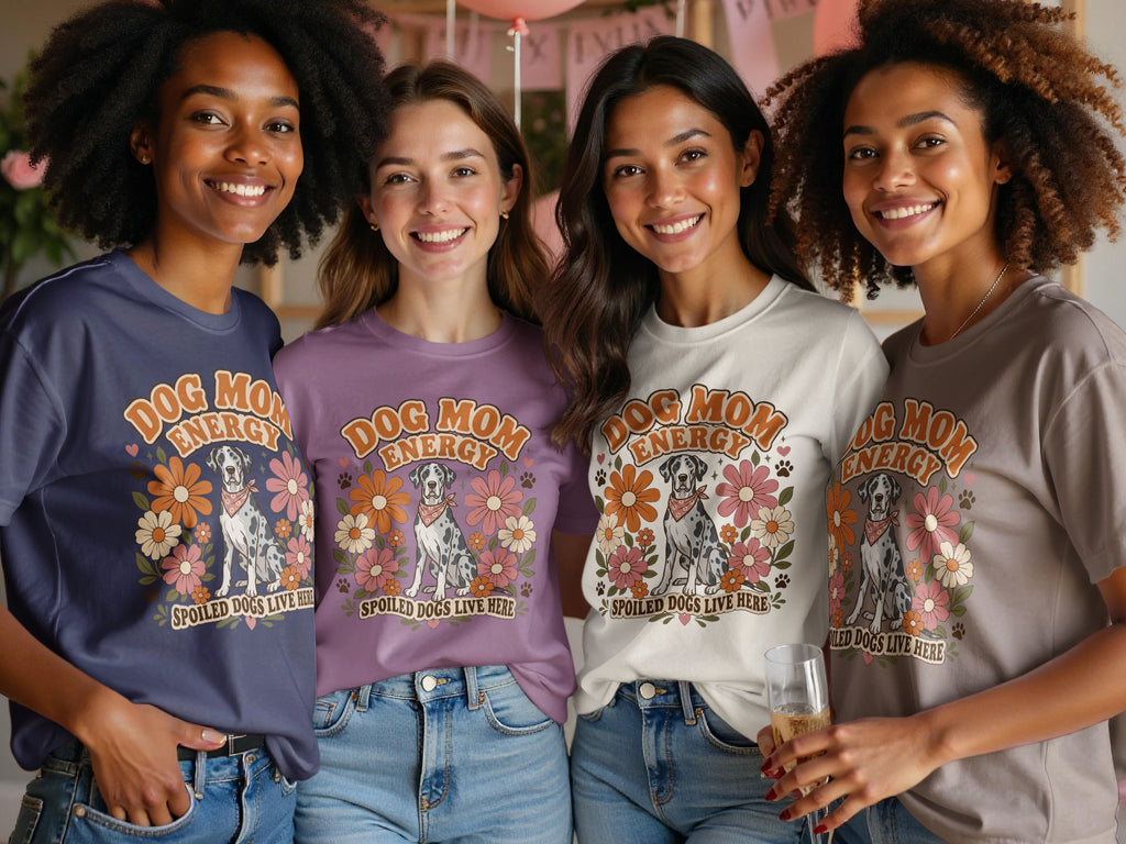 Four women model t-shirts with "Dog Mom Energy" and a Dalmatian design.