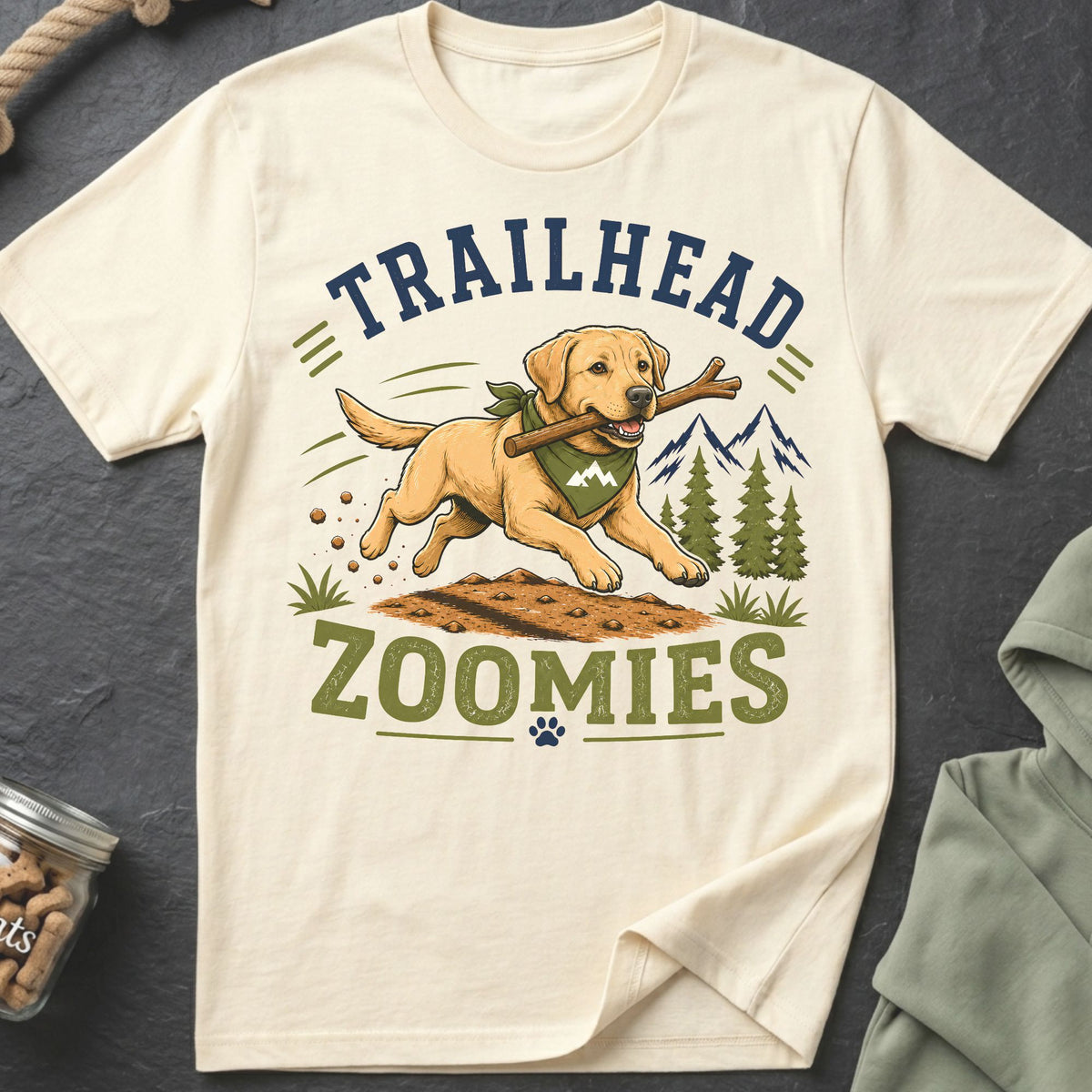 Cream t-shirt with dog graphic and text "TRAILHEAD ZOOMIES"