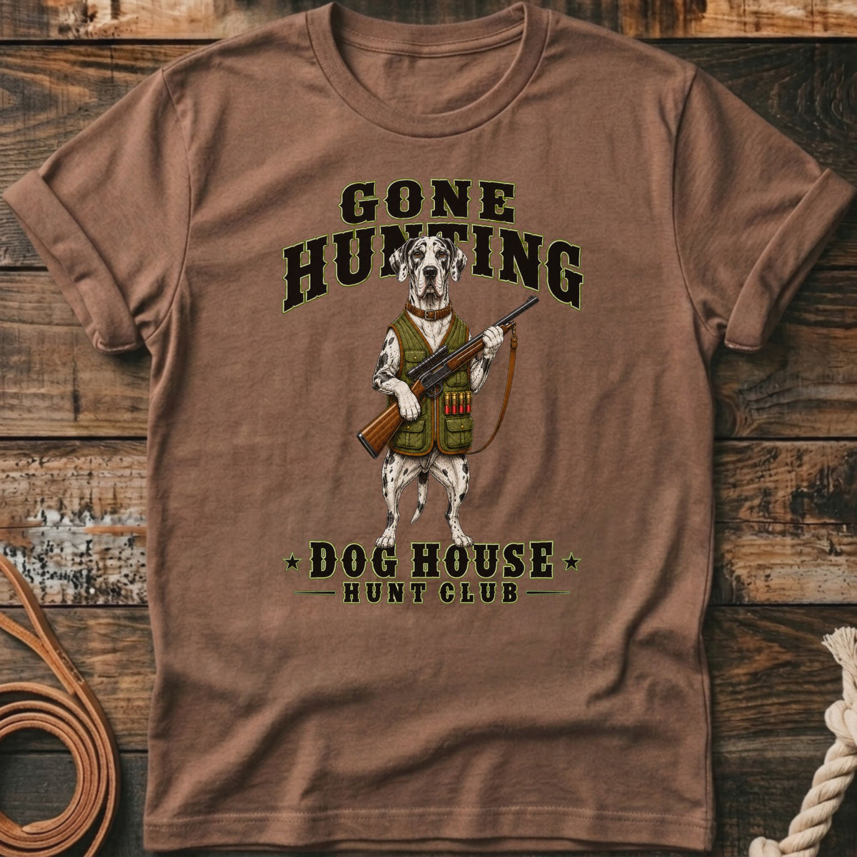 Dalmatian dog in hunting vest holding rifle with text "Gone Hunting Dog House Hunt Club."