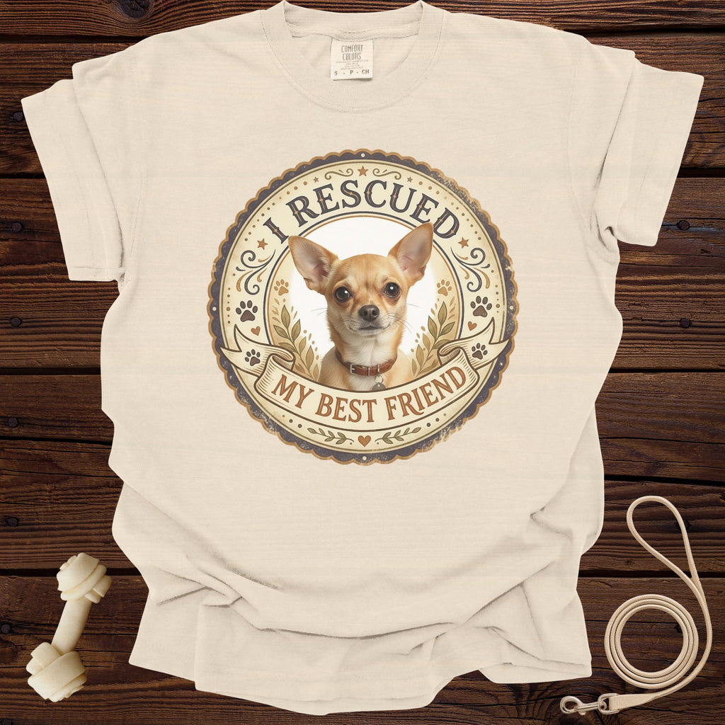 Cream t-shirt with a circular graphic featuring a Chihuahua and text "I RESCUED MY BEST FRIEND".