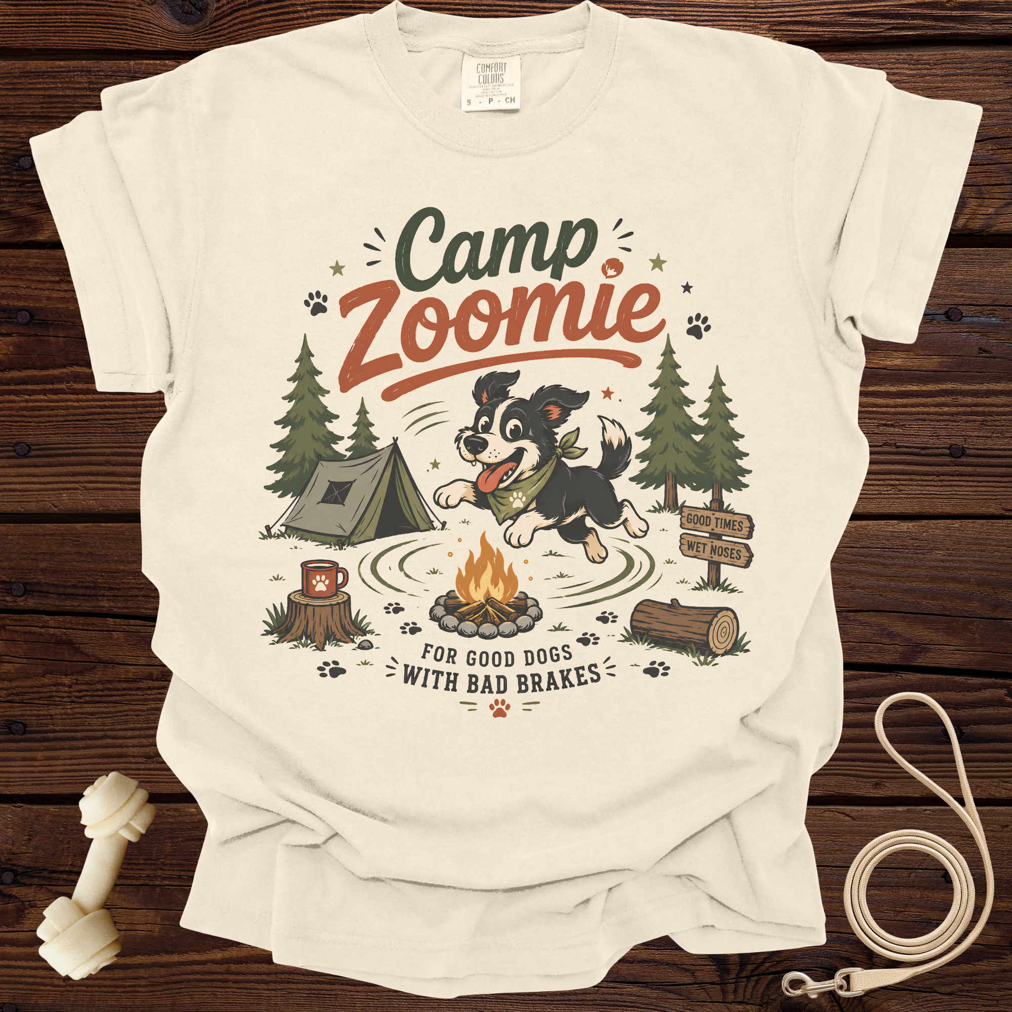 Cream t-shirt with "Camp Zoomie" graphic, dog, tent, and campfire.