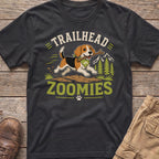 T-shirt graphic with a beagle dog holding a stick, text "TRAILHEAD ZOOMIES", and mountains.