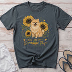 Dark gray t-shirt with a fluffy dog and sunflowers, reading "You Are My Sunshine Pup".
