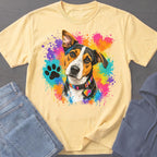 Light yellow t-shirt with colorful paint splatters and a dog wearing a rainbow collar.