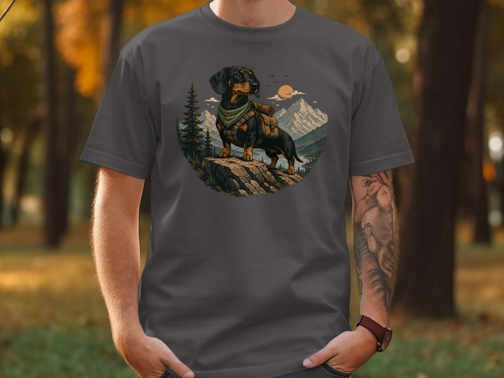 Dachshund wearing a bandana and backpack on a rock with mountain landscape.