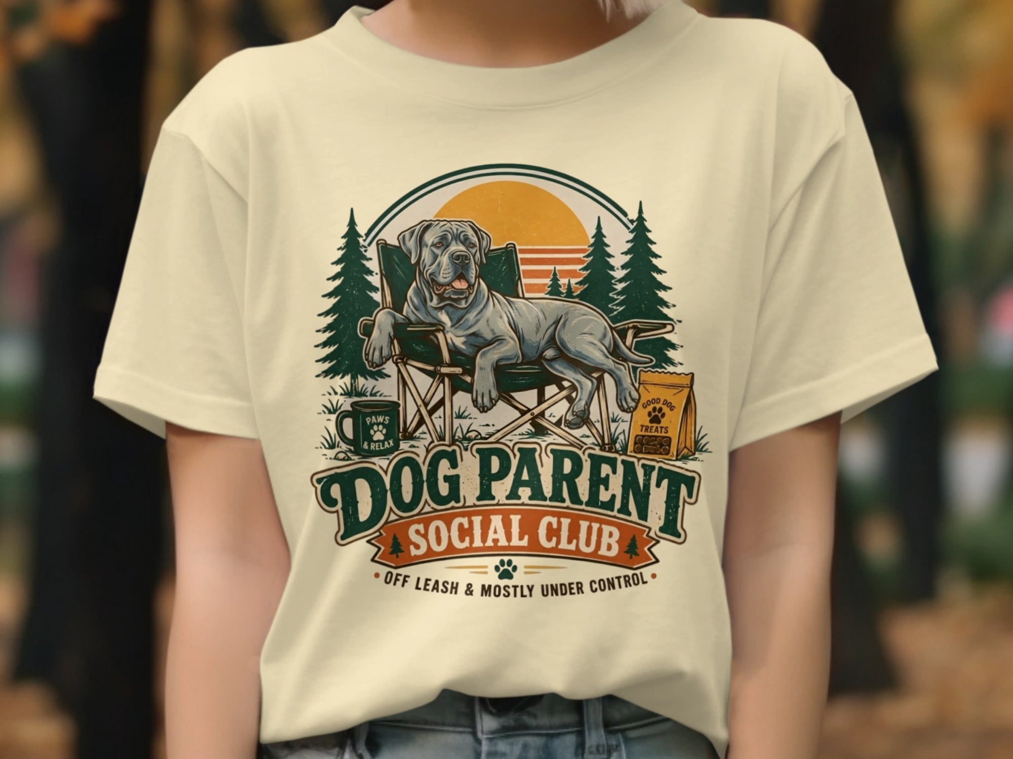 Dog relaxing in chair with "Dog Parent Social Club" text and paw print.