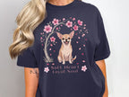 Chihuahua under cherry blossoms with text "Soft Heart Loyal Soul."