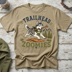 Husky with stick on shirt text "TRAILHEAD ZOOMIES" with mountain graphic