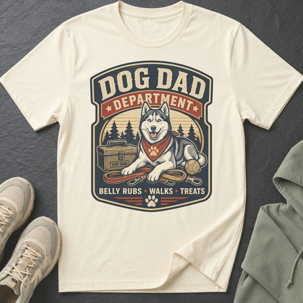Cream t-shirt with "Dog Dad Department" design featuring a husky, toolbox, and leashes.