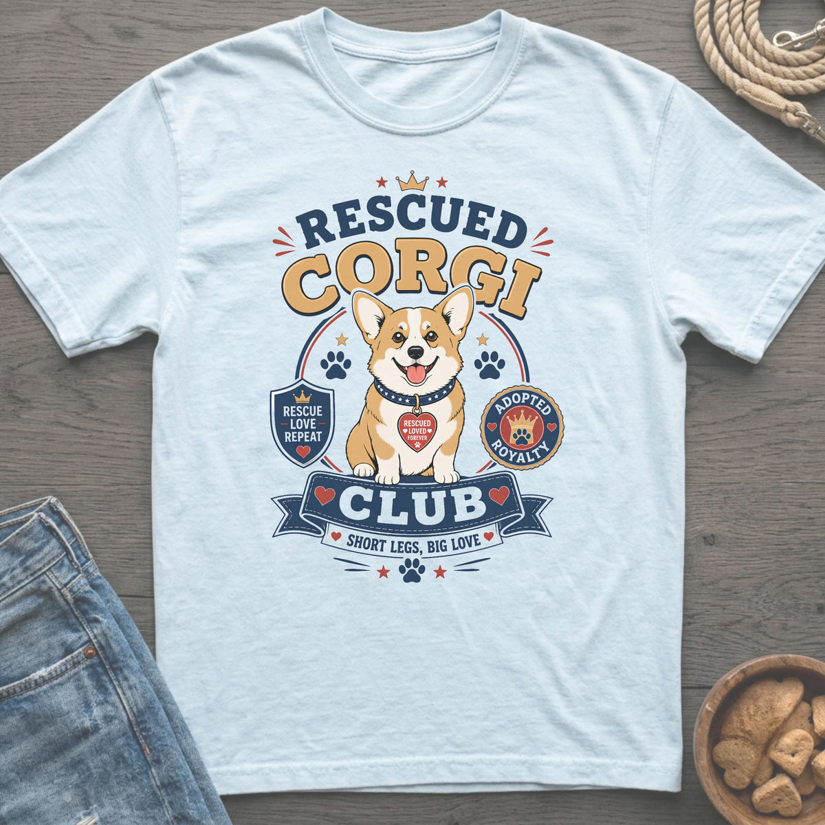 Light blue t-shirt with rescued corgi graphic and text "Rescued Corgi Club".