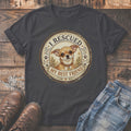 Dark grey t-shirt with rescued Chihuahua graphic reading "I Rescued My Best Friend."