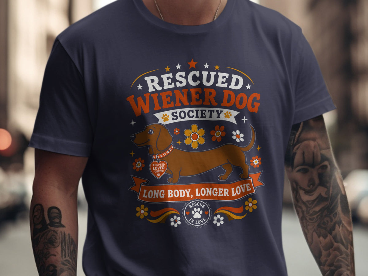 "Rescued Wiener Dog Society" t-shirt with a dachshund, flowers, and text.