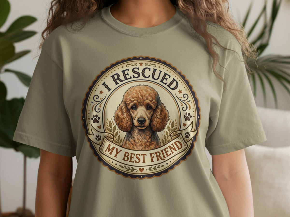 Poodle illustration on olive green t-shirt with text "I Rescued My Best Friend".