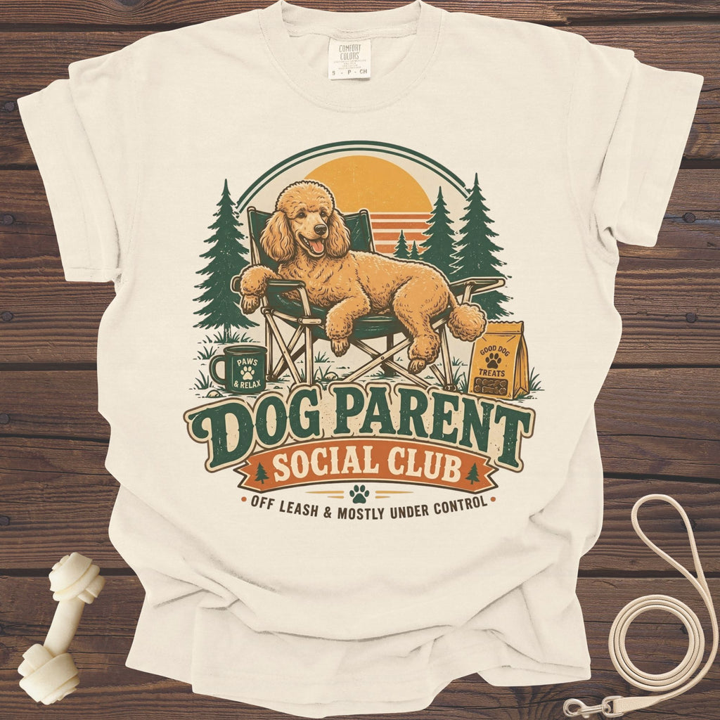 Dog Parent Social Club design with poodle in chair, trees, and sunset.