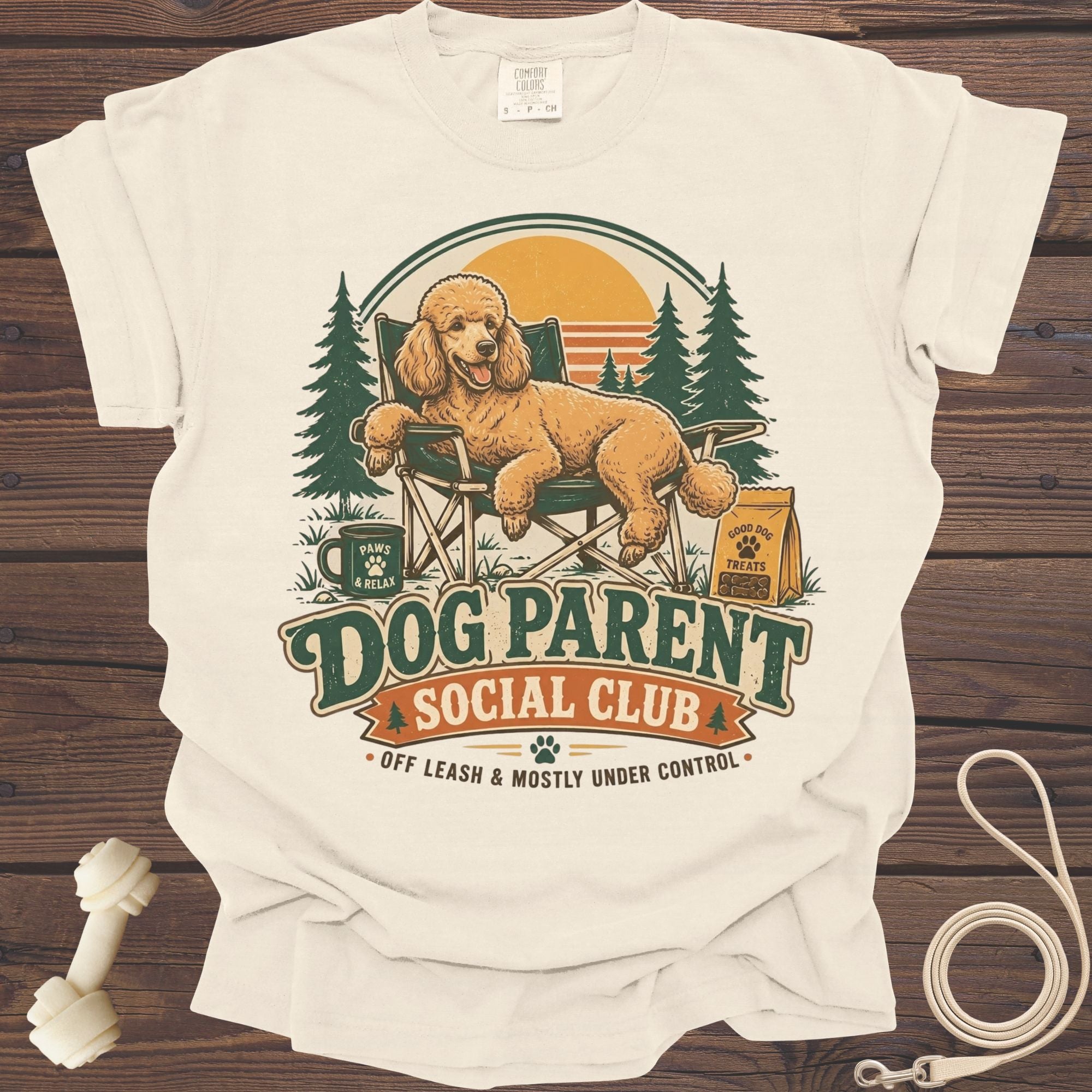 Dog Parent Social Club design with poodle in chair, trees, and sunset.