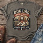 Dog Dad Department shirt featuring a dog with a bandana, leash, and treat box.