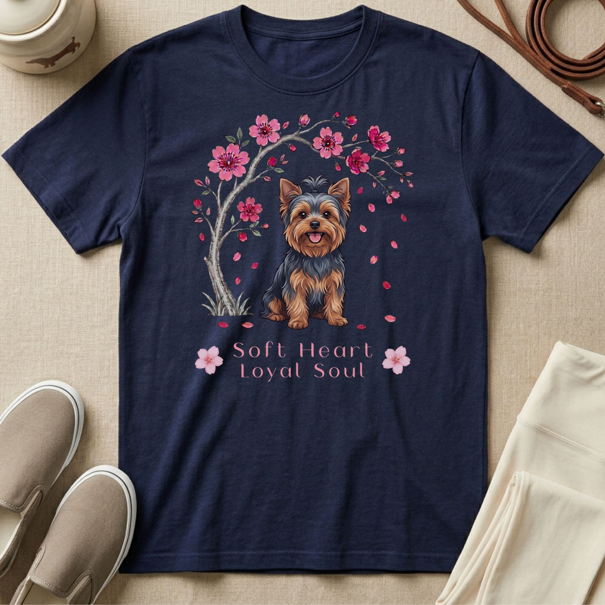 Navy t-shirt with a Yorkshire Terrier and cherry blossoms graphic.