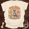 Cream t-shirt with retro graphic of dog, flowers, and text "Dog Mom Energy" and "Spoiled Dogs Live Here".