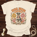 Cream t-shirt with retro graphic of dog, flowers, and text "Dog Mom Energy" and "Spoiled Dogs Live Here".