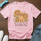 Pink t-shirt with golden retriever and sunflowers, reads "You Are My Sunshine Pup."