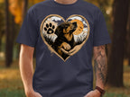 Dog's head in heart shape with paw print and sunset.