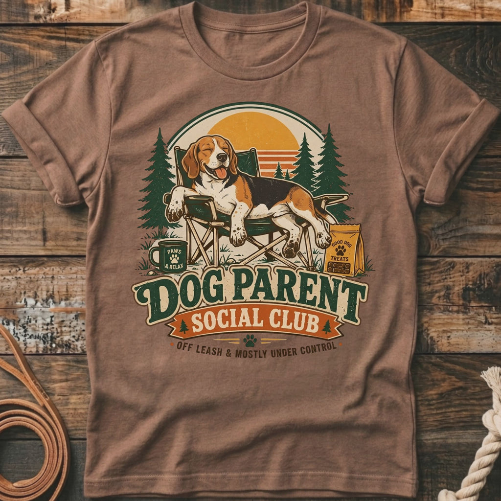 Beagle relaxing in camping chair with text "Dog Parent Social Club."