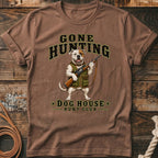 Bulldog in hunting vest holding rifle, text says "Gone Hunting Dog House Hunt Club."