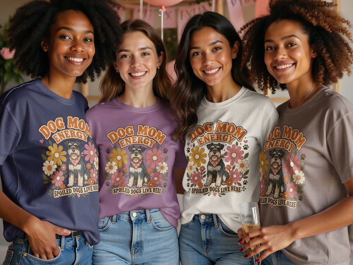 Four women model t-shirts with "Dog Mom Energy" and a schnauzer design.