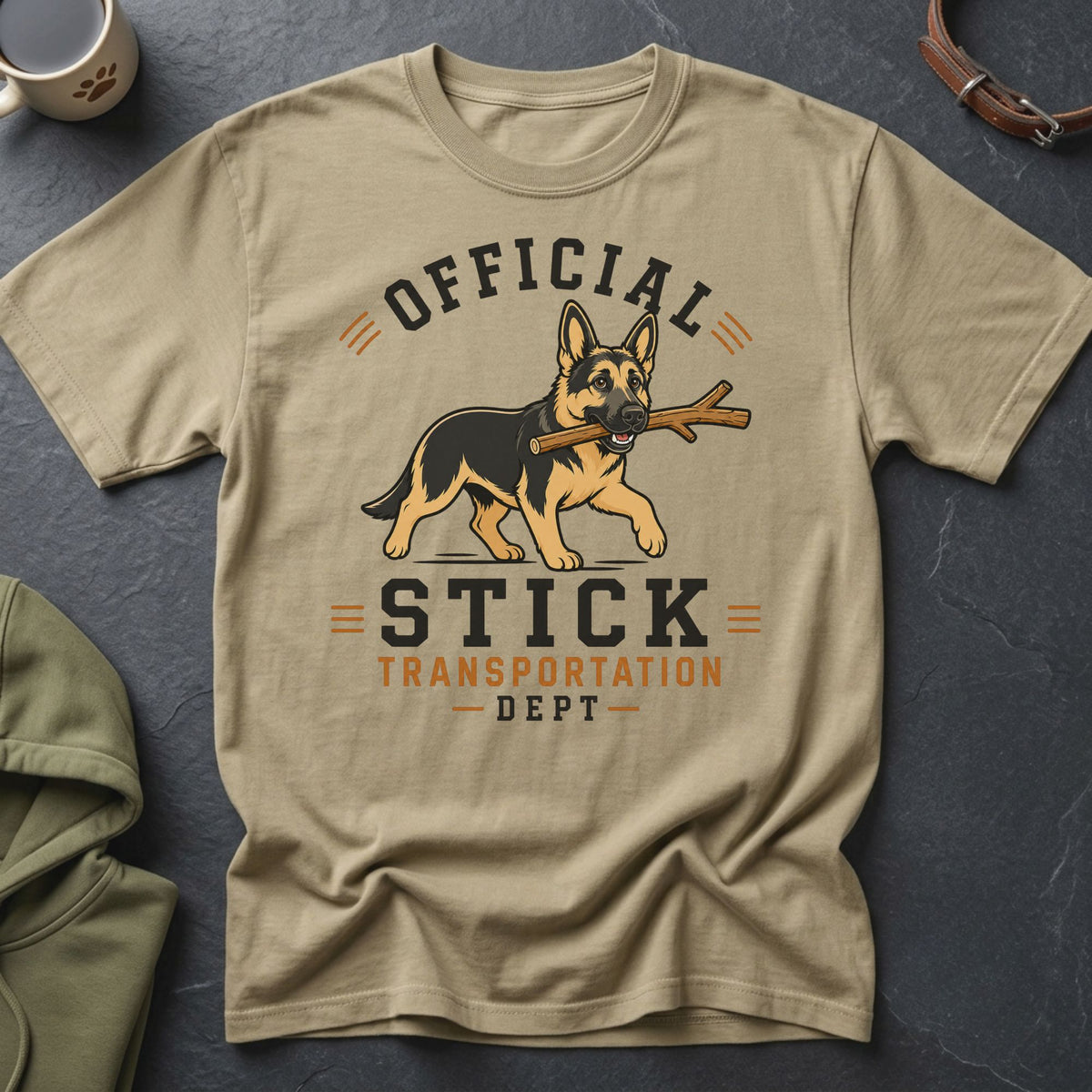 German Shepherd with stick on "Official Stick Transportation Dept" t-shirt.