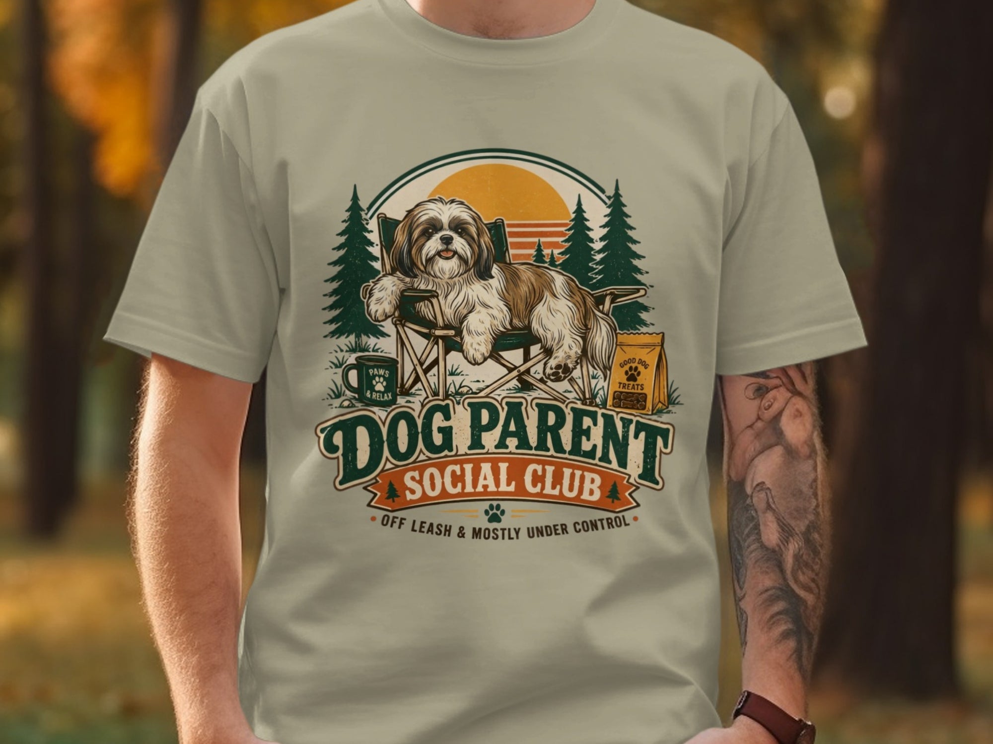 Dog Parent Social Club Shih Tzu graphic with a dog on a chair and forest background.