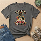Grey t-shirt with a corgi wearing a cape, sitting on a bone, and text "Tiny Dog, Big Opinions".