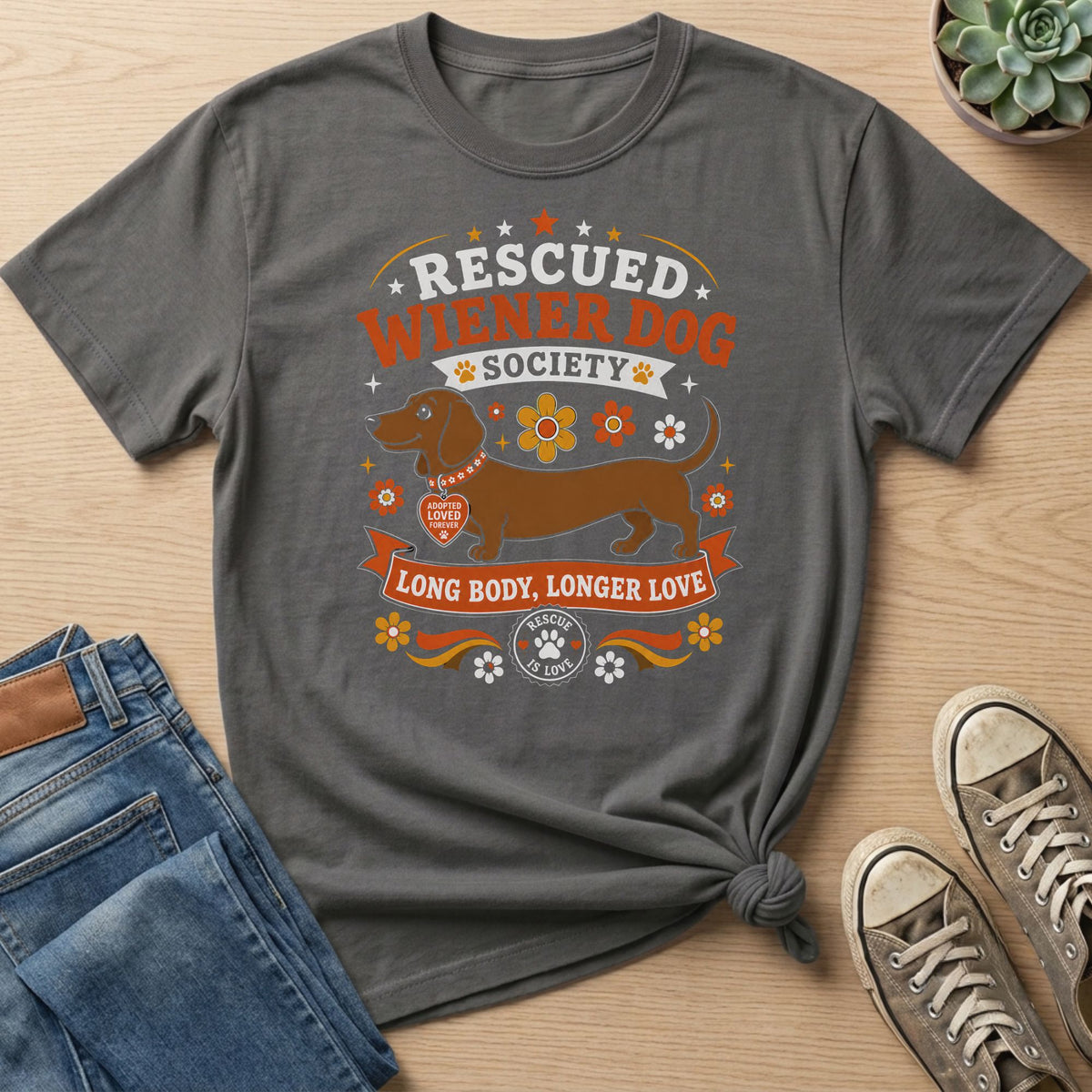 Rescued Wiener Dog Society graphic with a dachshund and "Long Body, Longer Love" text.