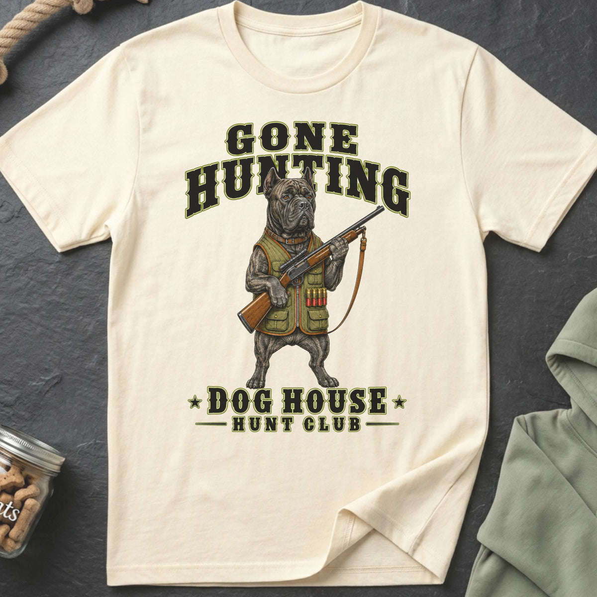 Cream t-shirt with a dog in hunting gear holding a rifle and text.