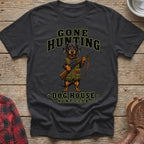 Dachshund wearing hunting vest and holding rifle with "Gone Hunting Dog House Hunt Club" text.