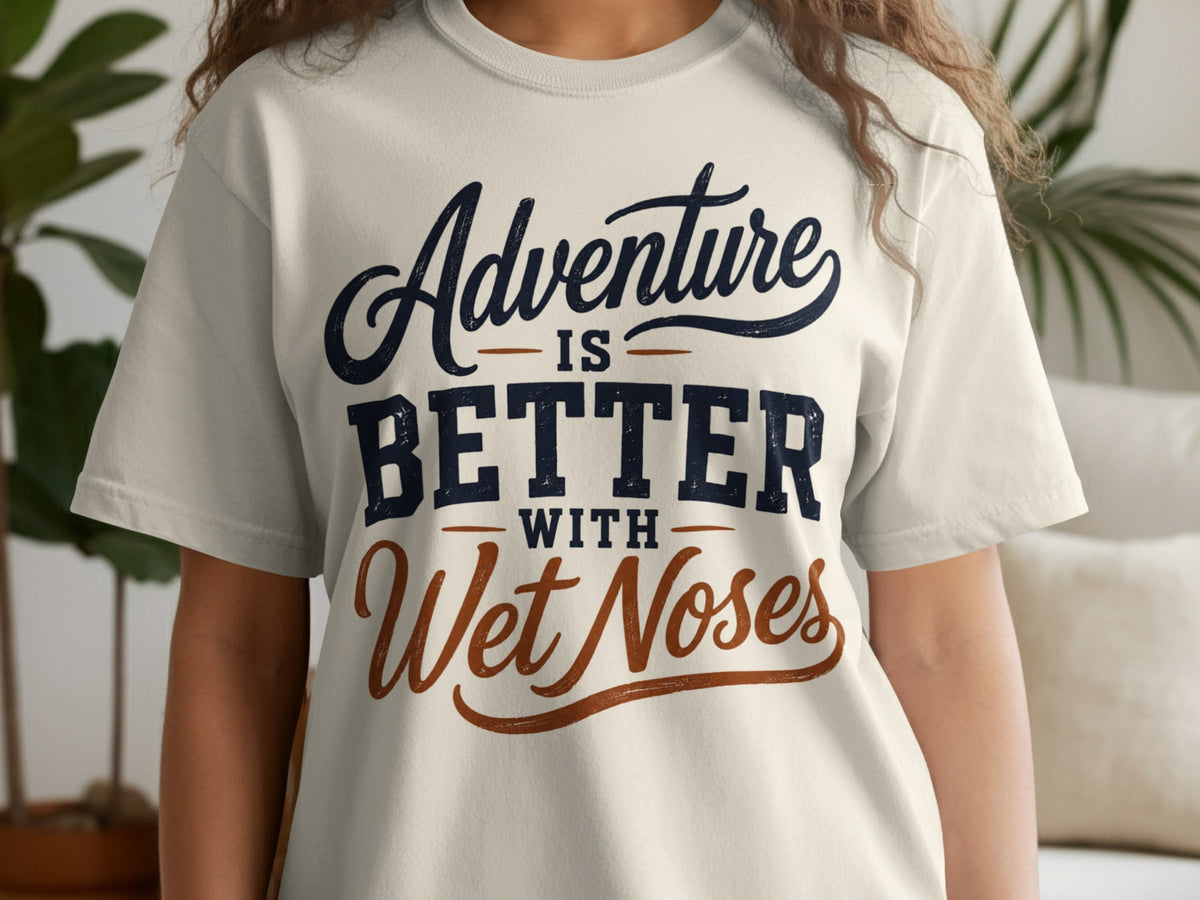Cream t-shirt with "Adventure is Better with Wet Noses" text design.