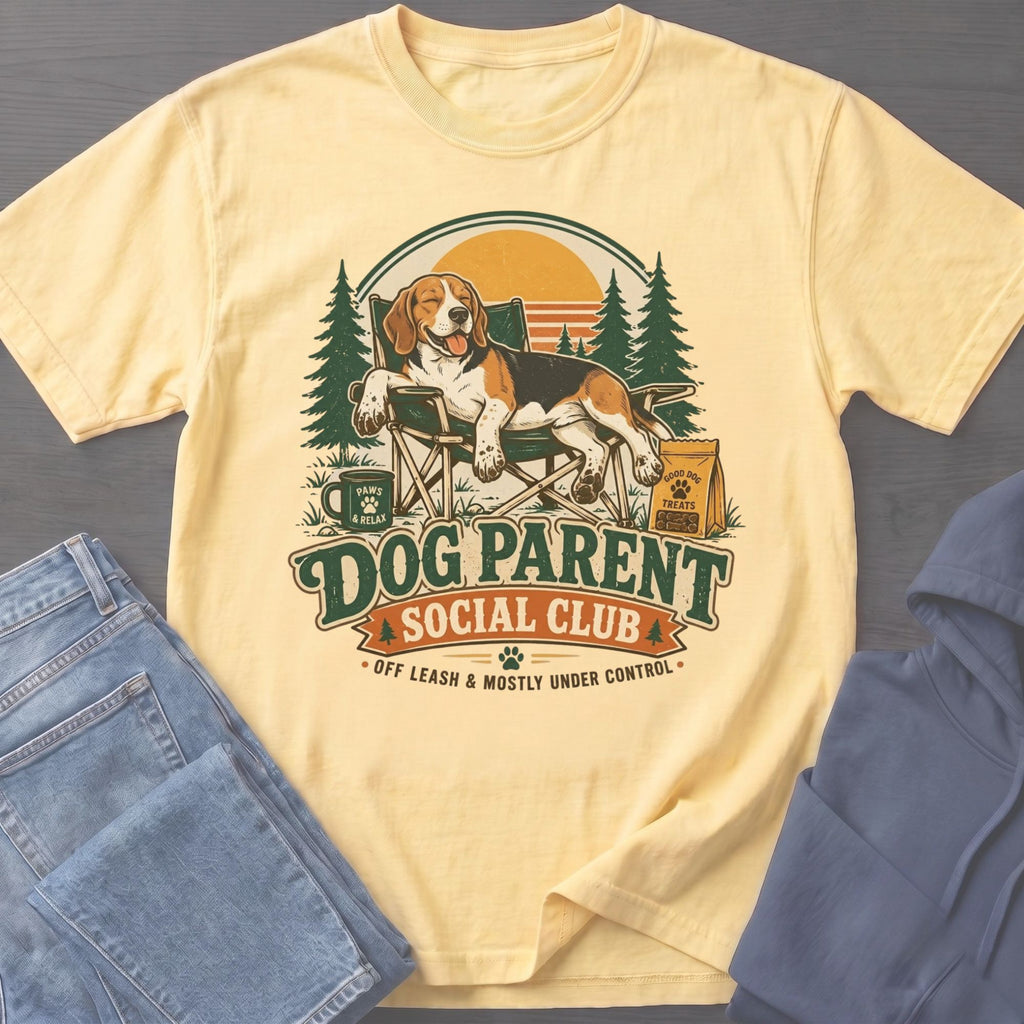 Beagle dog relaxing in a chair with "Dog Parent Social Club" text.