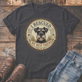 Dark grey t-shirt with a circular graphic of a schnauzer and "I Rescued My Best Friend" text.