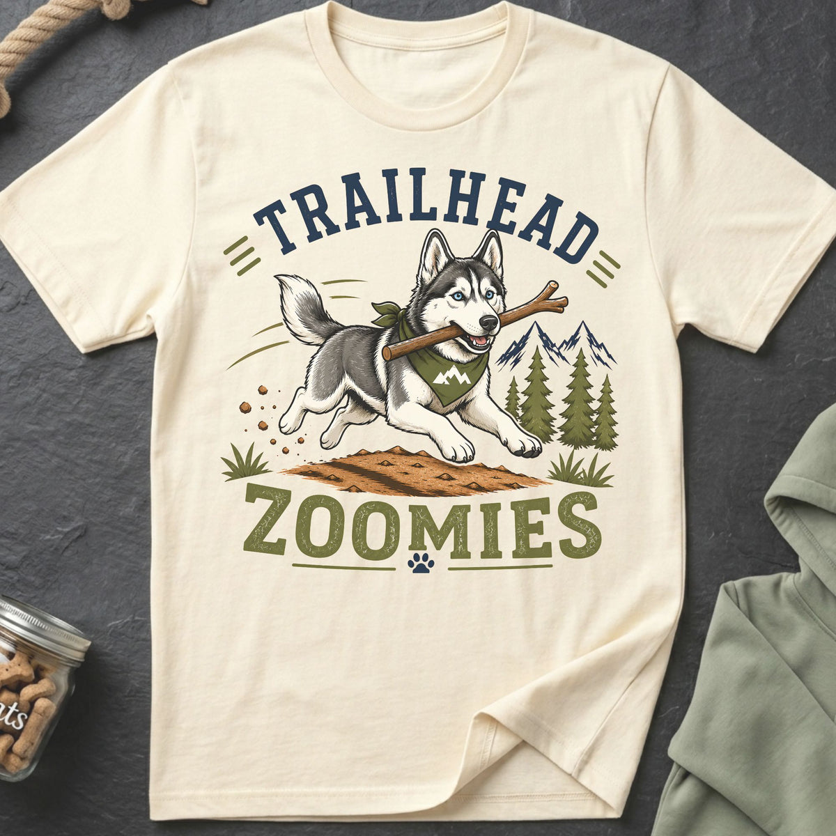 Cream t-shirt with husky, stick, trees, mountains, and text "Trailhead Zoomies".
