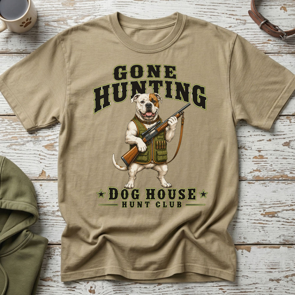 Bulldog in hunting vest with rifle, "Gone Hunting Dog House Hunt Club" text.