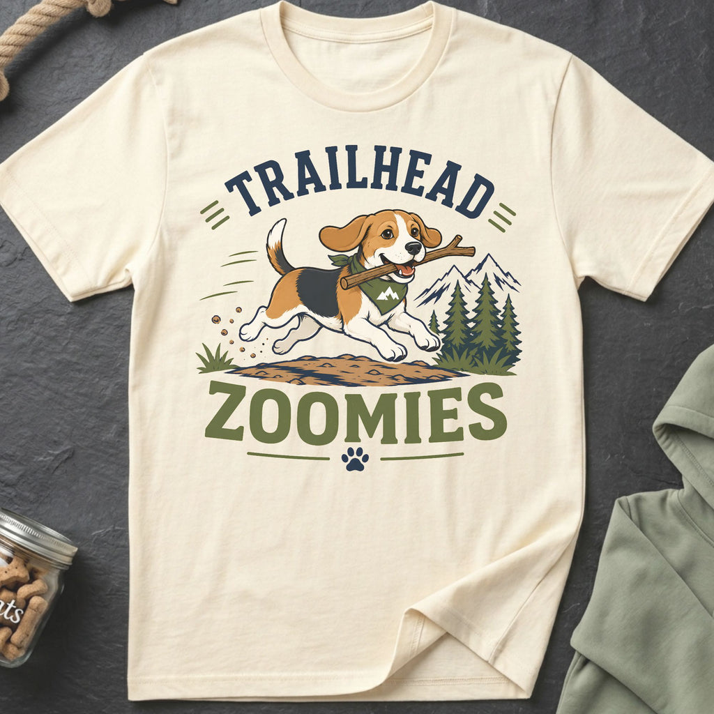 Beagle dog running with stick on shirt with text "Trailhead Zoomies"